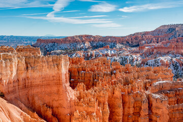 Bryce canyon national park in winter, unique rock formations in utah covered in snow, orange rocks in snow, cold winter in the usa