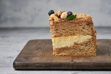 Cake with meringue sponge cake with hazelnuts and butter cream.