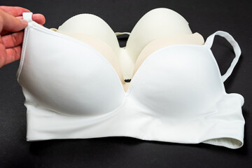 White underwear bra isolated on black background