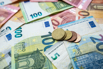 background of euro bills and coin, cash money