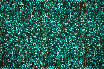 Background turquoise beads close-up. Bead jewellery.