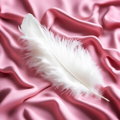 Fluffy white feathers on pink silk fabric. 