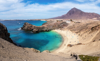 Aerial view of Playa de Papagayo beach, with blue clean water and white sand, this is one of the...