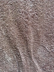 Brown towel texture, fabric background.