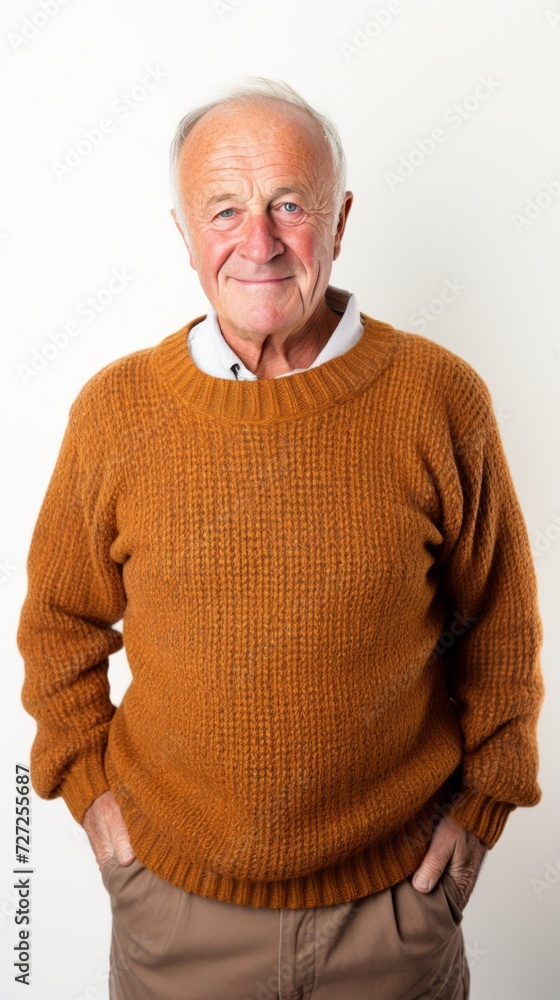 Poster stock image of an elderly man in a cozy sweater on a white backdrop generative ai