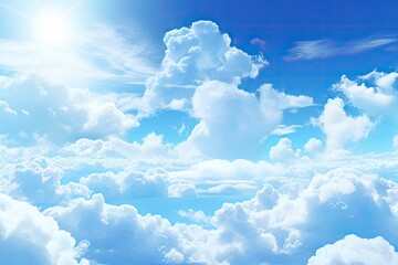 Naklejka na ściany i meble the sun is shining through the clouds in a blue sky