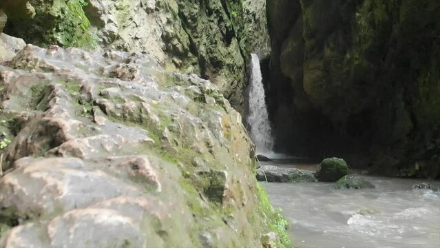 Caucasus, North Ossetia. Midagrabin gorge. Waterfall in the canyon.