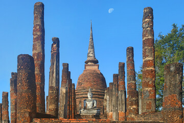 Majestic Wat Sa Si temple with moon on the background at day, Sukhothai Historical Park,Thailand