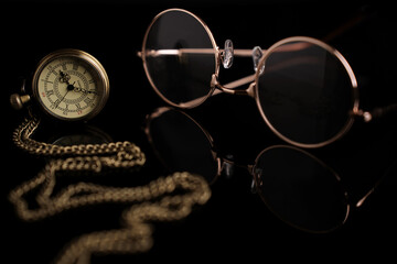 Clock pocket watch time and eyeglasses