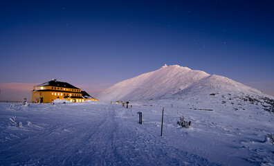 Sniezka mountain at dusk during winter in Giant mountains  - 727266020