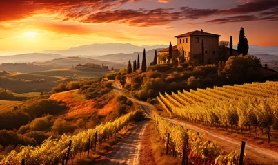 Fotobehang Breathtaking Sunset Over Lush Tuscan Vineyards with Rolling Hills, Historic Italian Architecture and Vibrant Autumn Foliage © Bartek