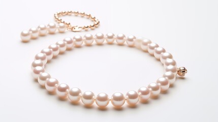 Obraz premium A single elegant pearl necklace isolated on white draped gracefully on a clean pure spotless white surface