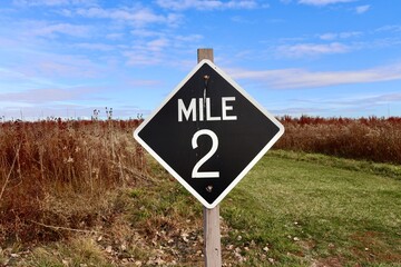 A close view of the mile marker on the trail.