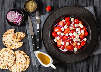 tomato salad with red onion and white cheese