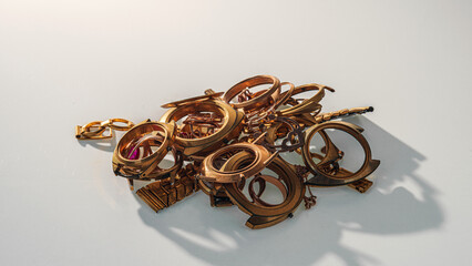 A scrap of gold. Old and broken jewelry, watches of gold and gold-plated lies in a pile.