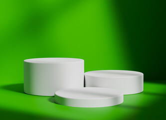 White cylinder podium with green background for product display with shadows and light
