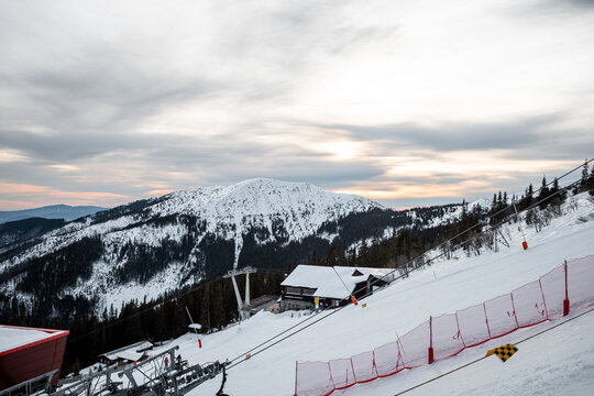 ski lift in the mountains with a beautiful sky
