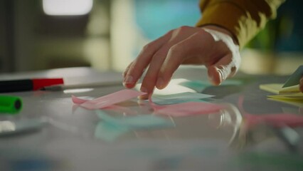 Notebook. Team member responsible employees analyze data in innovative creative office. Experienced professional working on options for selecting notes, studying research data, generating ideas