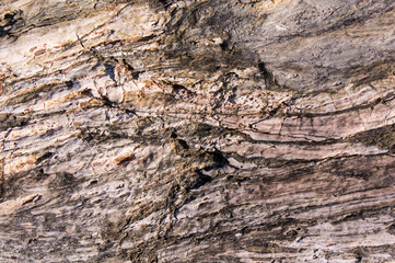 Red stones, blue sky, green water