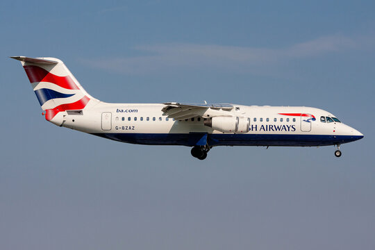Schiphol, Netherlands - August 6, 2009: British Airways BAe Avro RJ-100 with registration G-BZAZ on final for Amsterdam Airport Schiphol