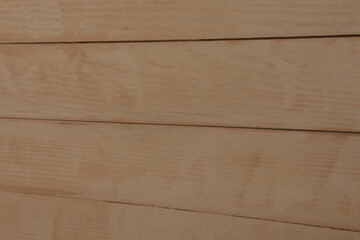 Fototapeta premium Vintage brown wood background texture with knots and nail holes. Old painted wood wall. Brown abstract background. Vintage wooden dark horizontal boards. Front view with copy space