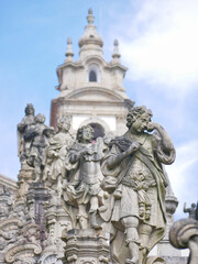 Fototapeta na wymiar Sculptures on the stairs leading to Bom Jesus do Monte church