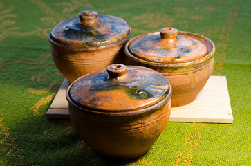 Obraz premium Vintage Ceramic Pots for Baking Food in the Oven or Oven