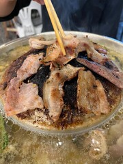 Grilled pork on a charcoal grill,Thai food