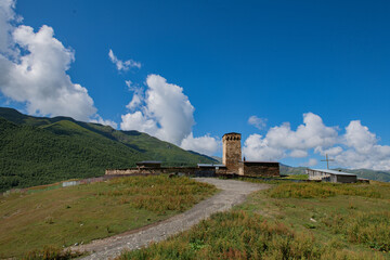 Timeless Beauty: Ruins, Mountains and Ethereal Clouds