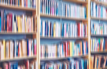 Motion blurred rows of books, abstract background.