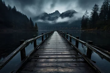Foto op Canvas Wooden jetty over the mountain lake with forest on rainy cloudy gloomy day © Маргарита Вайс