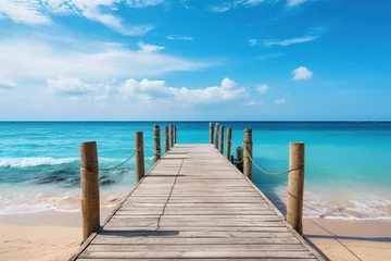 Fotobehang Wooden jetty over the clean blue sea or ocean on tropical beach on sunny summer day © Маргарита Вайс