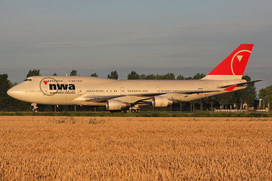 Hoofddorp, Netherlands - August 2, 2008: Northwest Airlines Boeing 747-400 with registration N669US rolling on taxiway V of Amsterdam Airport Schiphol