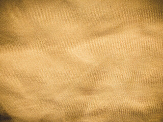 old khadi fabric texture background. light natural linen texture for the background.Golden yellow...