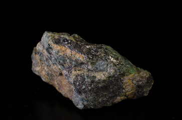 Hematite stone mineral on black background.