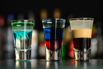 multi-layered cocktail shots at the bar