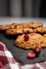 Healthy oatmeal cookies for breakfast. Cookies made from banana, oat flakes, dried cranberries and natural seeds and seeds. the Healthy desserts.