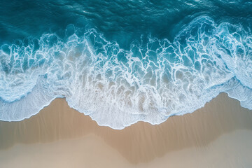 High Angle View Of Beach. Aerial view of clear turquoise sea. Aerial view of clear turquoise sea and waves. Wave textures washing onto a beach shot from above