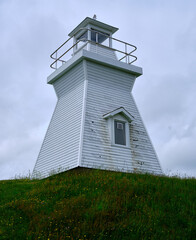 The old wooden Decommissioned Balache Point Lighthouse in Nova Scotia - 727396032