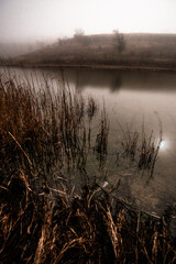 Fogy lake . Mystery lake . Frost lake . Fogy in the river . Night lake . Night photography. Beach and stones . Clouds in night 