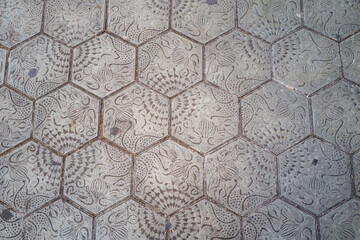 Patterned cement tile background texture for graphic design. Concrete material taken from Barcelona boardwalks in spain