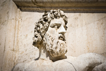 Statue from the Fontana Dea Roma at Piazza del Campidoglio, Rome, Italy