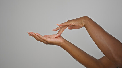 African american woman touching hand over isolated white background