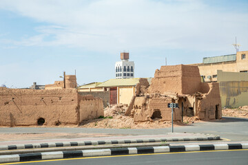 Arabian castle ruined watch tower and wall on the streets of Hail, Saudi Arabia