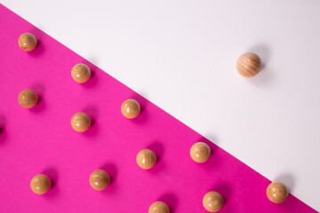 Wooden balls, leadership, positioning in business individual and unique concept