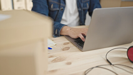 Young caucasian man ecommerce business worker using laptop at office