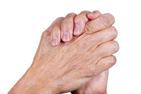 Close up of aged hands clasped together
