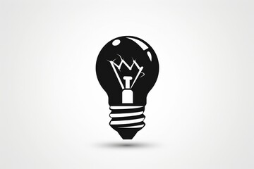 A regal and illuminating logo design featuring a black light bulb adorned with a majestic crown