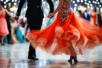 person dancing in a ballroom with elegant dresses and suits