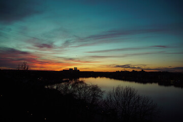a sunset over a river